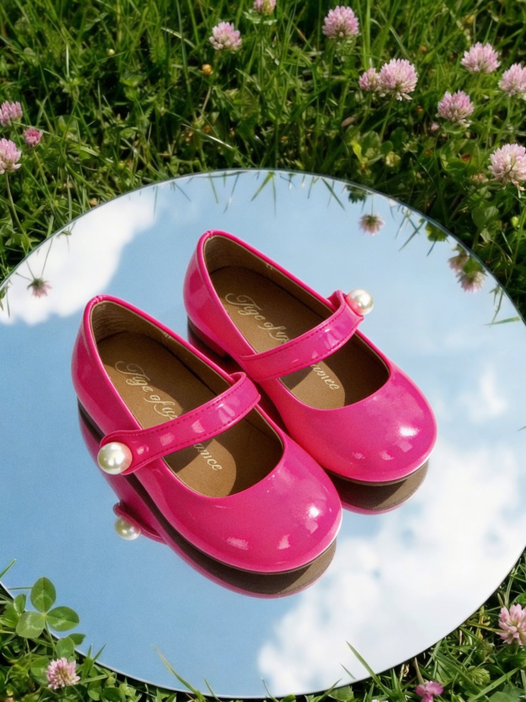 Celia Bright pink shoes — pearl accent close-up